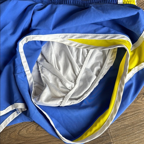 Nike Blue and Yellow Athletic Shorts with Dolphin Hem - Picture 4 of 4
